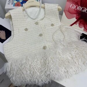 Chic Cream Vest with Faux Fur Hem- fits like a M